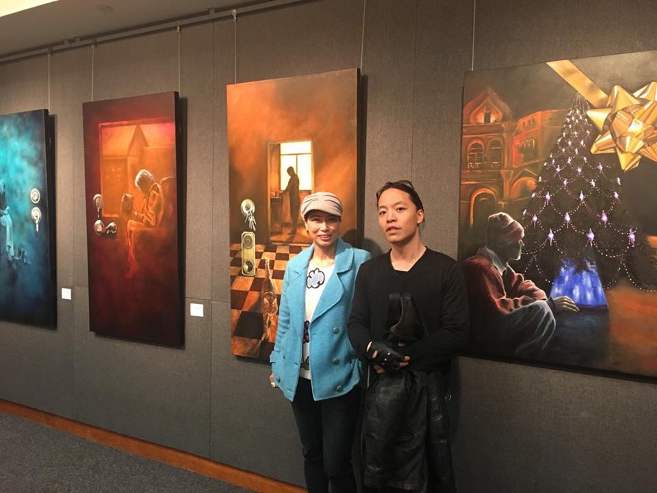 Michael Andrew Law and his student Carman